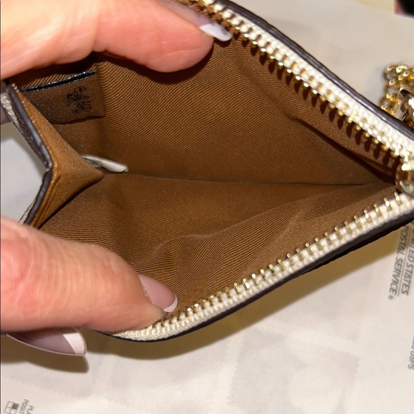Coach Cream Wristlet with Red Apple Design